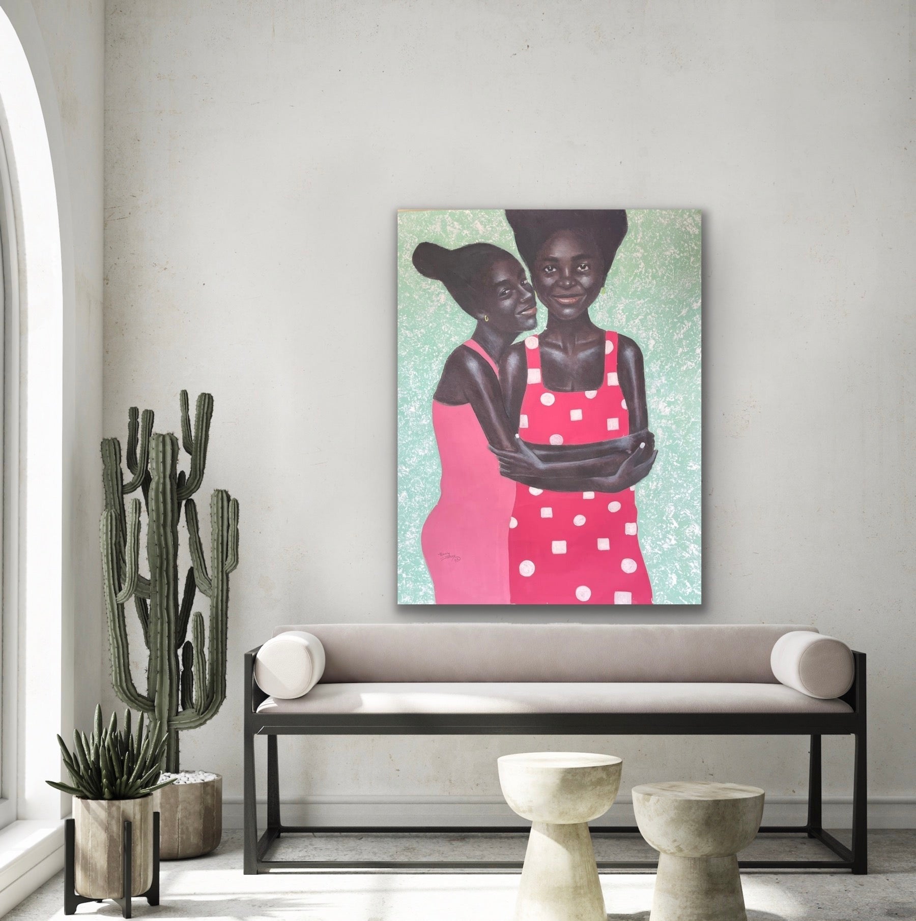 Colourful contemporary original portrait painting with an oak mount frame, hanging up in a living space against dark wall