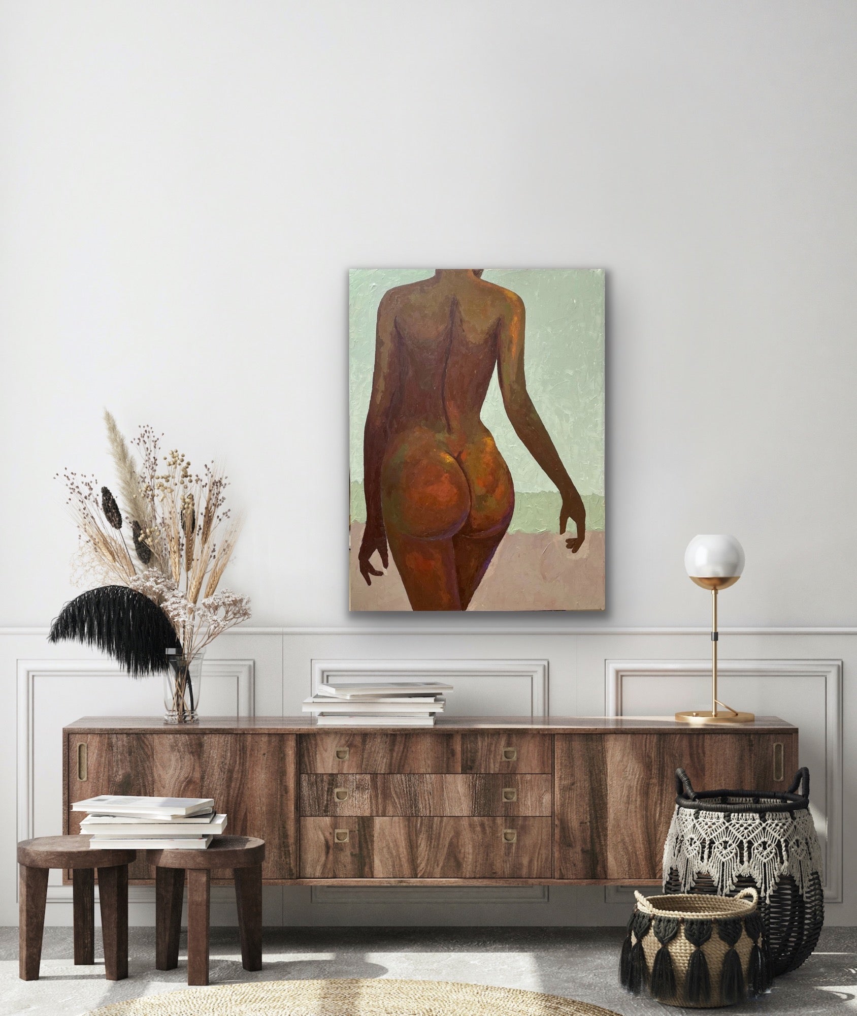Framed painting of black female body in a sensual pose and neutral tones by Nigerian artist Faith O Sidneu