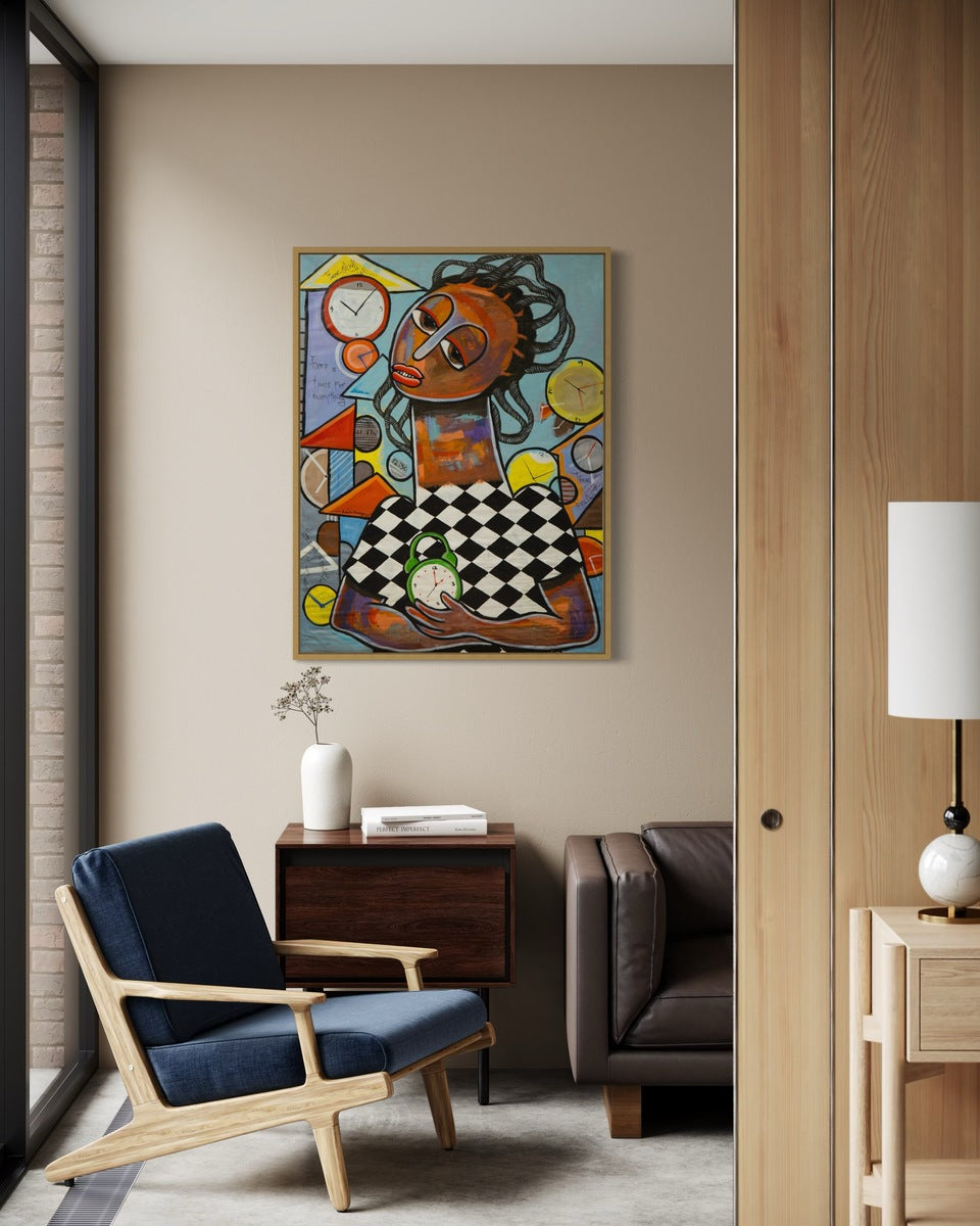 A modern living room features a blue armchair, brown sofa, wooden side table, and "Time for Everything" by Achike Anayo, an acrylic on canvas cubist-style painting of a person holding a checkerboard on a beige wall.