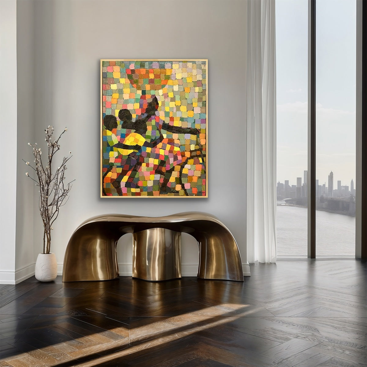 A modern minimalist room features Lola's "Power in mother," a colorful hand-signed abstract painting of two figures, above a gold sculptural console table and tall vase with branches, beside large windows with city and river views.
