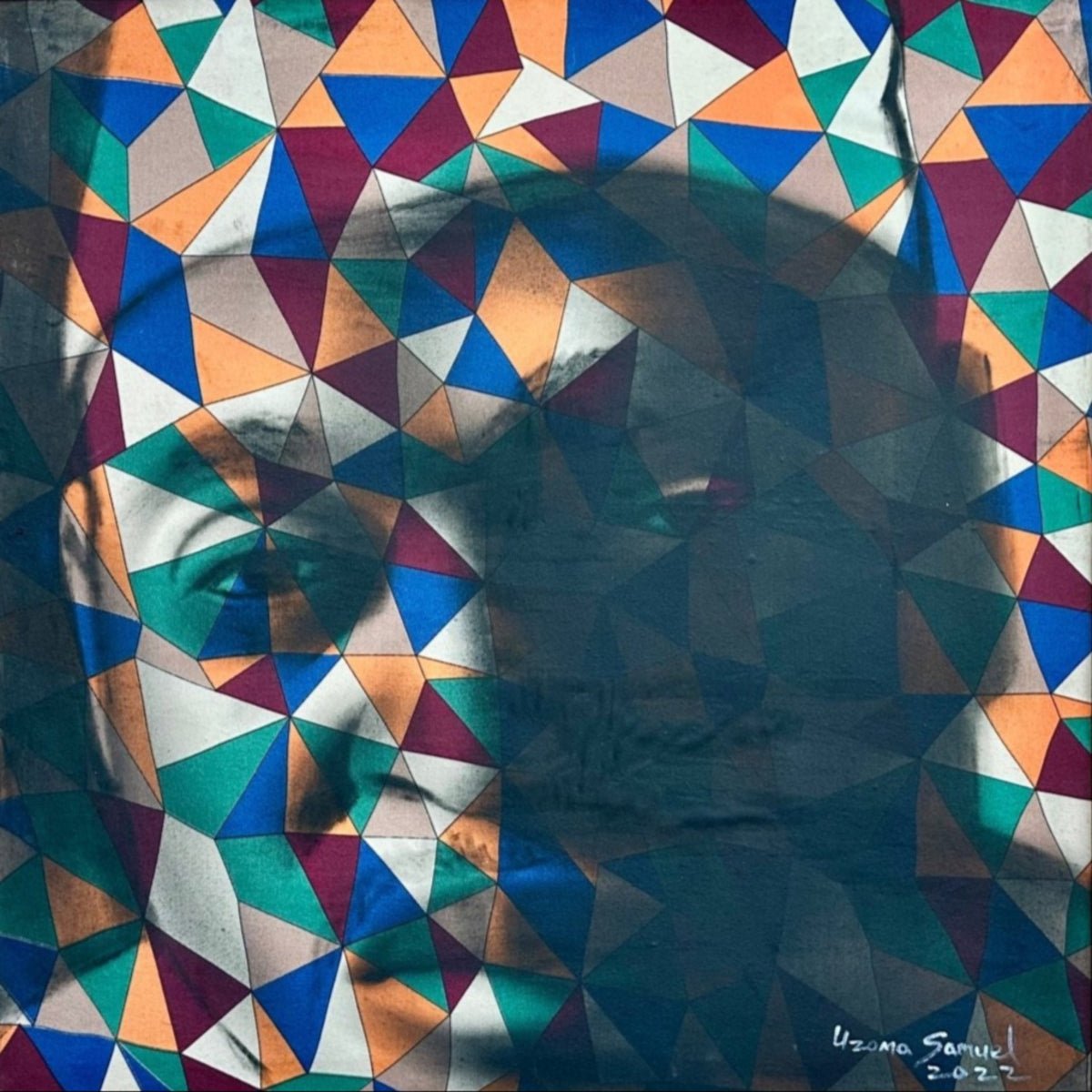 Abstract Figurative Portrait 'Self' by Uzoma Samuel— a geometric mosaic art featuring a face with realistic and abstract patterns in blue, orange, teal, and brown triangles. Framed acrylic on canvas, signed by Uzoma Samuel (bottom right).