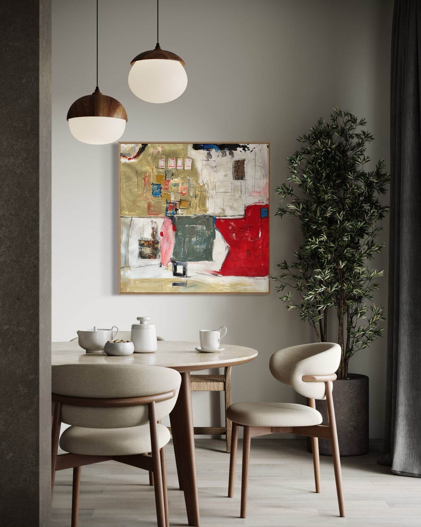 A modern dining area features a round wooden table, four beige chairs, a tea set, potted plant, pendant lights, and "Urban Tapestry" by Kehinde Badmuss—a contemporary African acrylic on canvas—displayed on the wall.