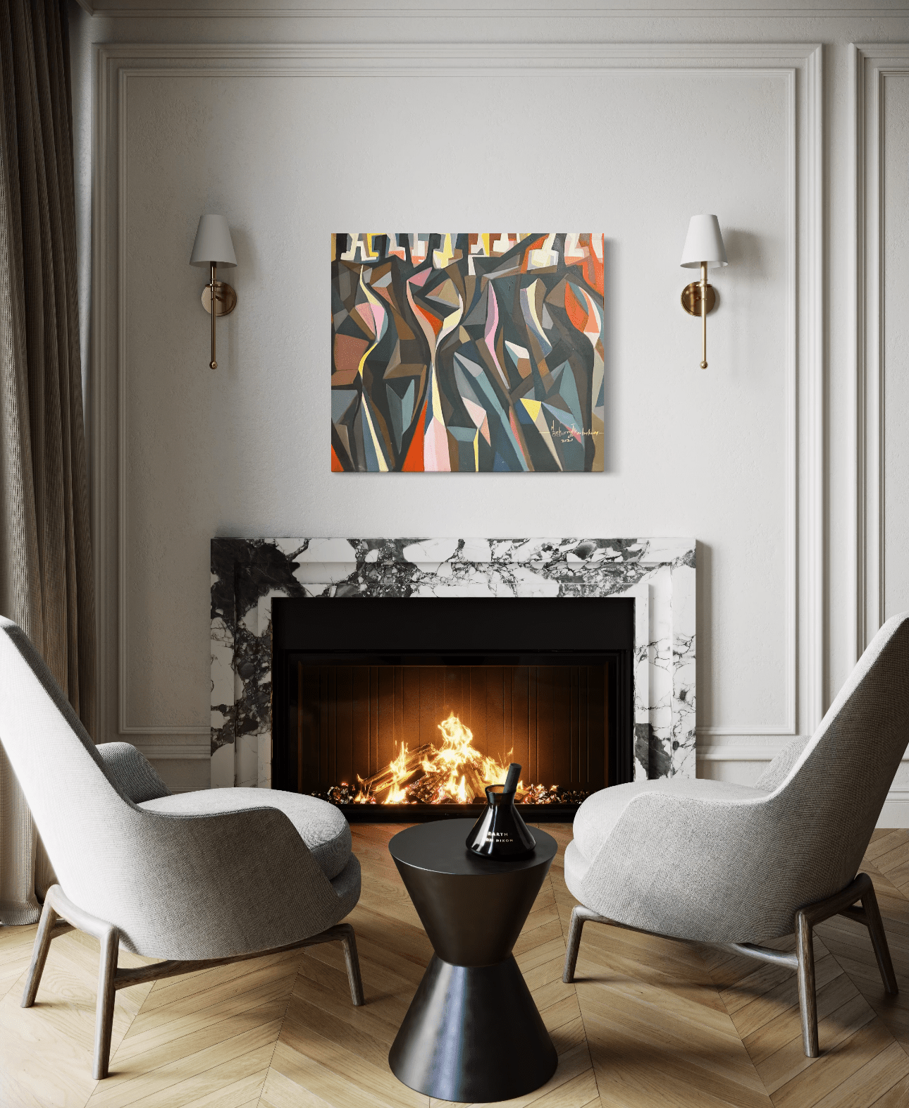 Two modern armchairs face a black marble fireplace with a fire burning. Above the mantel hangs 'The Red Man' 78x78 cm by Barry Ikechukwu, an abstract artwork in earthy tones, flanked by two wall sconces on a white wall.