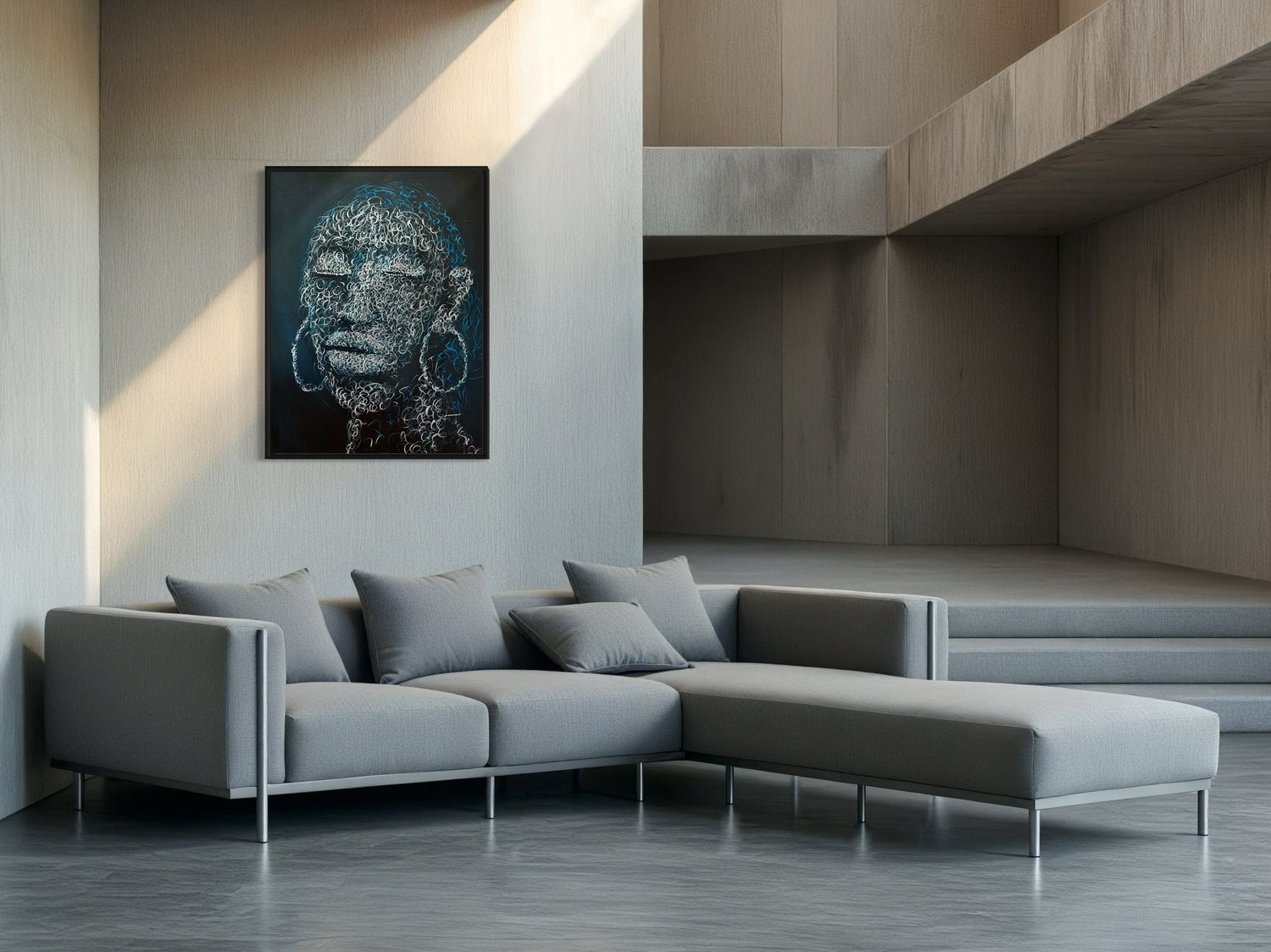 A modern living room with a light gray sectional, matching pillows, and "Circle of purity" by Bamidele—an acrylic on canvas portrait—hangs on a wooden wall. Sunlight streams in, casting shadows for a calm ambiance.