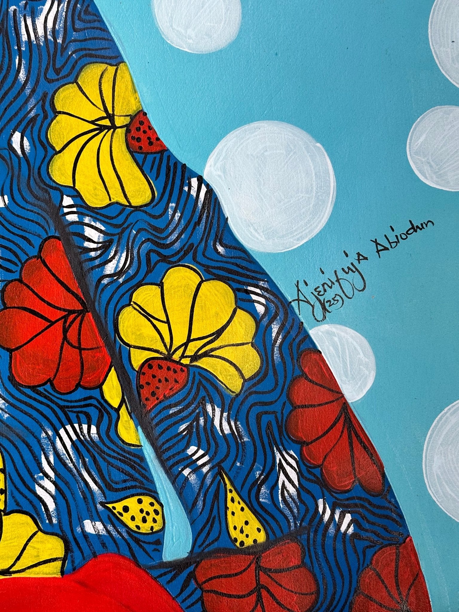 A close-up of Enigmatic Beauty: "Lady" by Ajenifuja Abiodun shows a patterned arm with bold yellow and red flowers on blue, large white dots on the light blue background, and a signature in black.