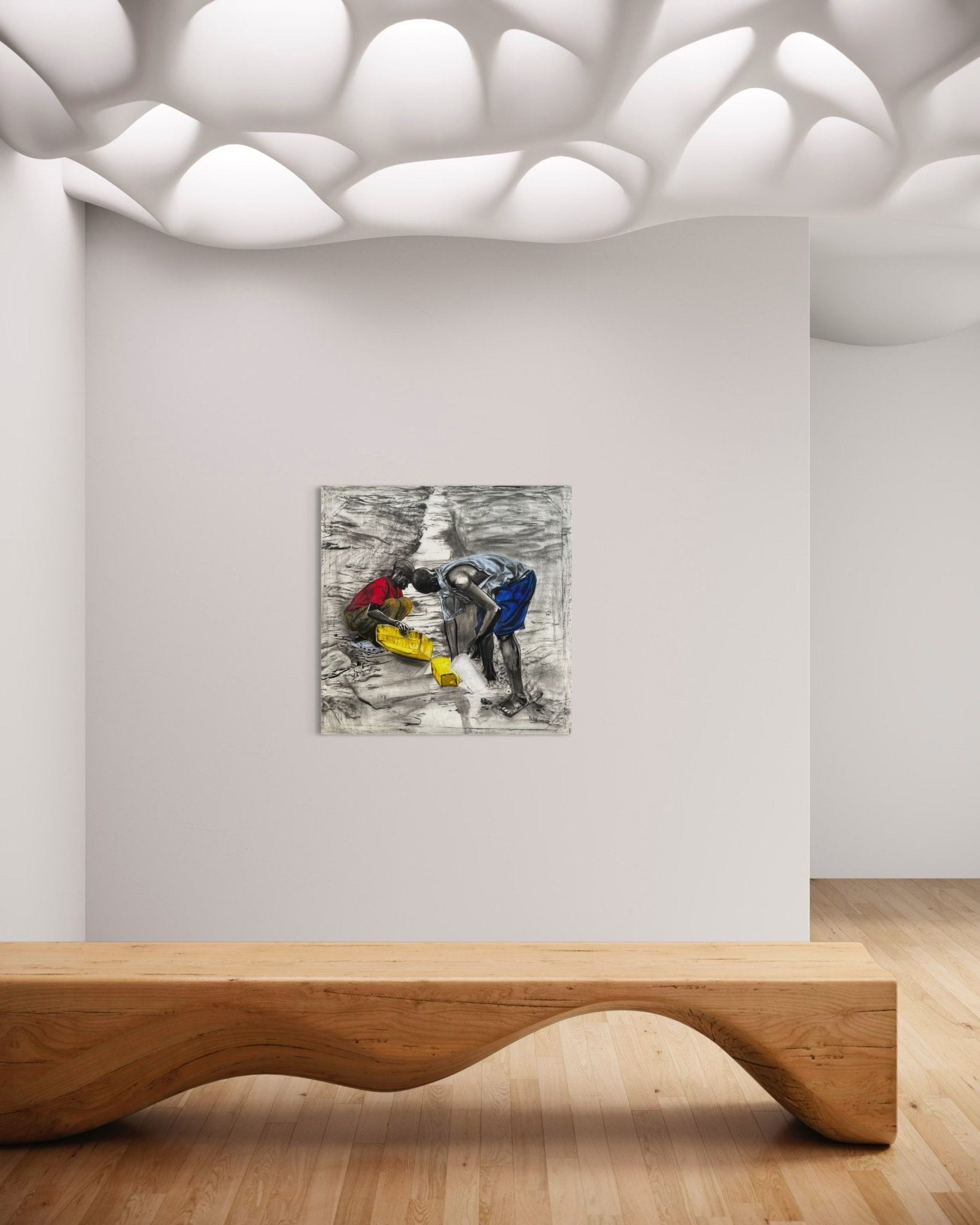 A modern gallery with a wavy wooden bench, white walls, and sculpted ceiling lights features "Fetching Water" by Bibianna African Art Collective—a vibrant painting of three people in colorful attire displayed above the bench.
