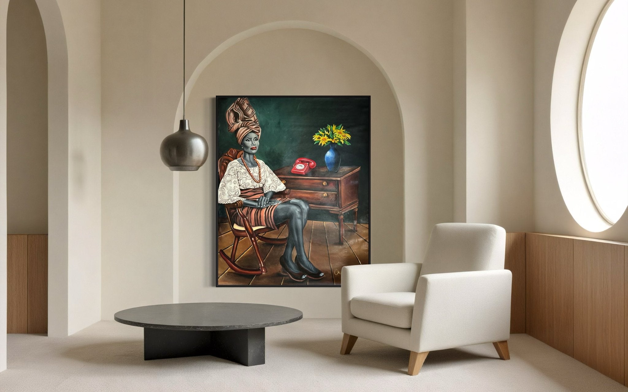 A minimalist room features a round coffee table, white armchair, and "I Am Ready"—a regal vintage portrait of a Yoruba woman in traditional attire by Azeez Okulaja—hung above, with sunlight pouring through a circular window.