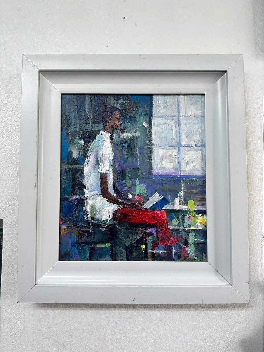 Waiting" by Wande George is a framed acrylic on canvas painting showing a person in white and red clothing reading near a window, with abstract, muted brushstrokes.
