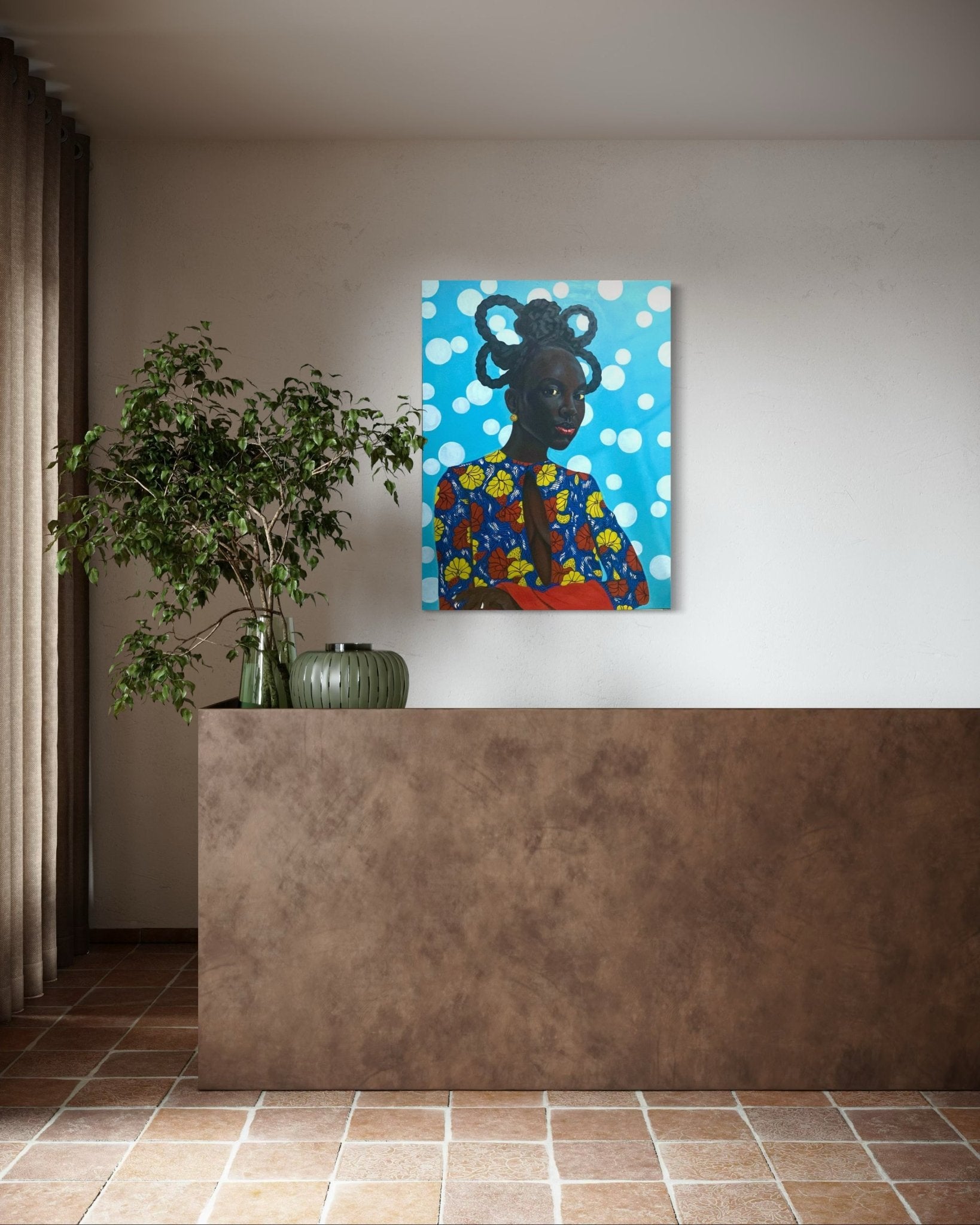 A modern, minimalist room with a brown stone counter, potted plant, and "Enigmatic Beauty: 'Lady'" by Ajenifuja Abiodun—a vibrant African portrait on a blue polka-dotted background—adds contemporary flair to the white wall.