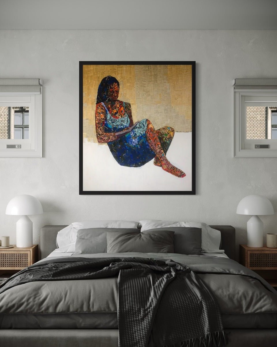 A cozy bedroom with a gray bed, white bedding, and two bedside tables with lamps. Above the bed hangs Seye Morakinyo's "Mixed Media Painting of a Woman In Pages of Writing 'Love Book'," flanked by two windows.