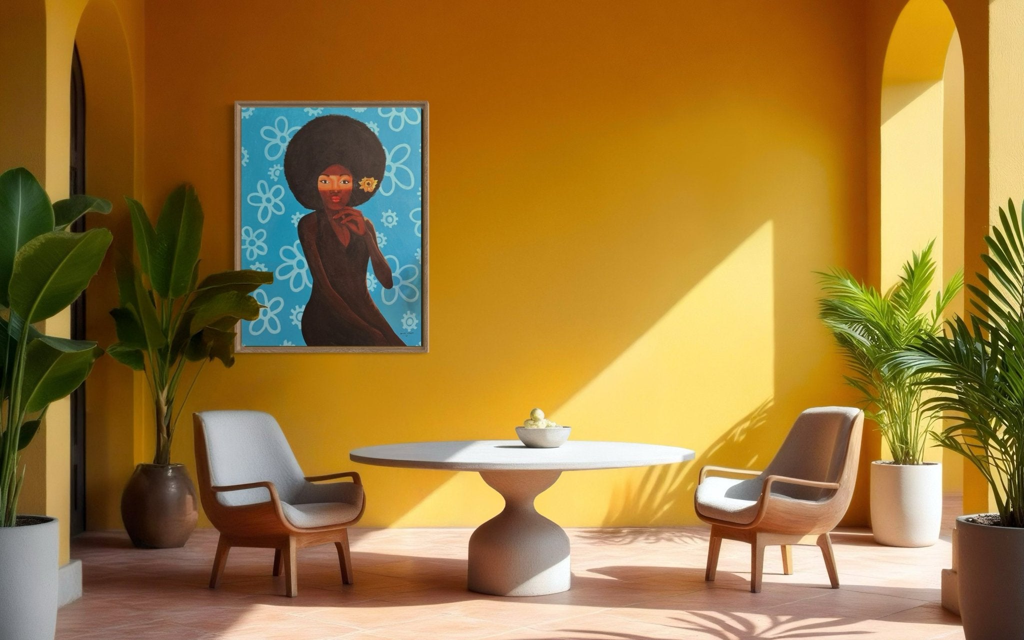 A modern, sunlit room with yellow walls, two stylish chairs around a round table, potted plants, and "My Afro 2" by Afuope Opeyemi—an acrylic portrait of a woman with an afro that includes a certificate of authenticity.