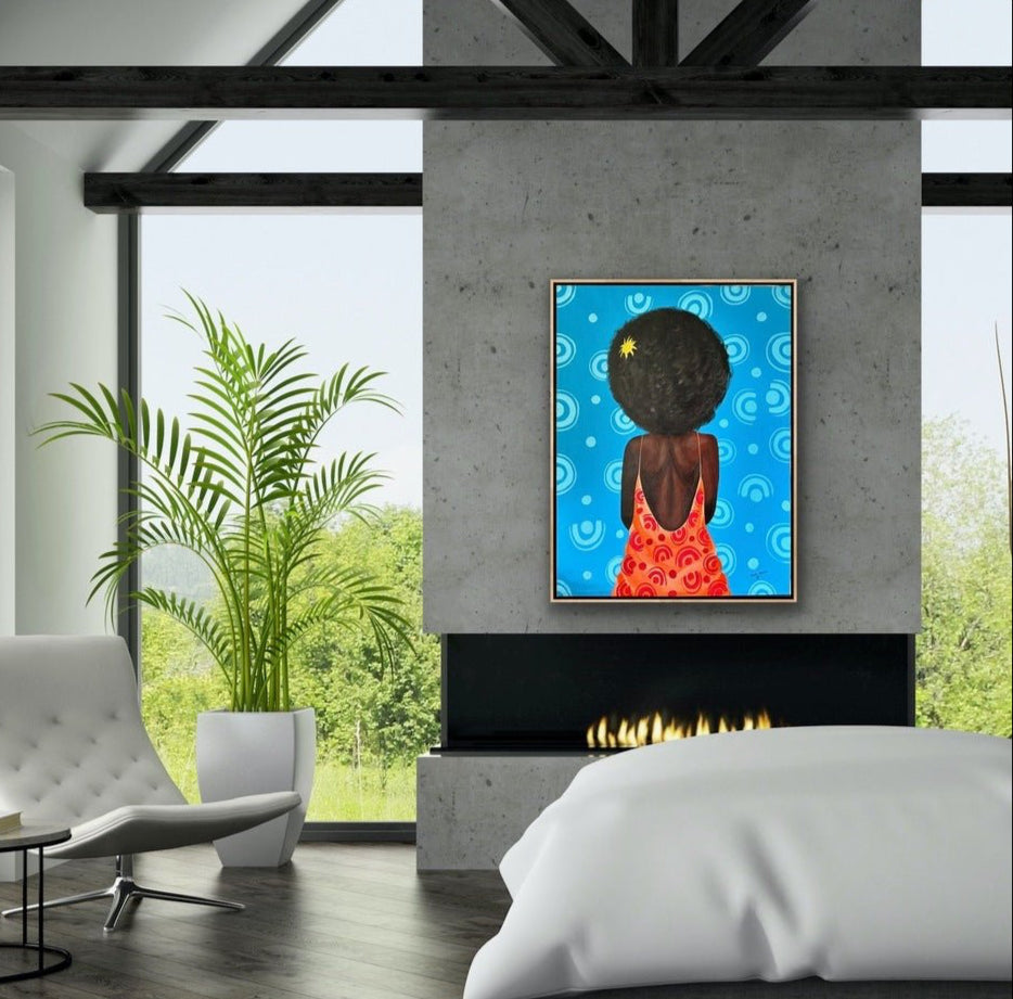 A modern living room with large windows, gray fireplace, white chair, plant, and sofa features Afuope Opeyemi's "My Afro," a vibrant contemporary African portrait by Afuope Opeyemi.