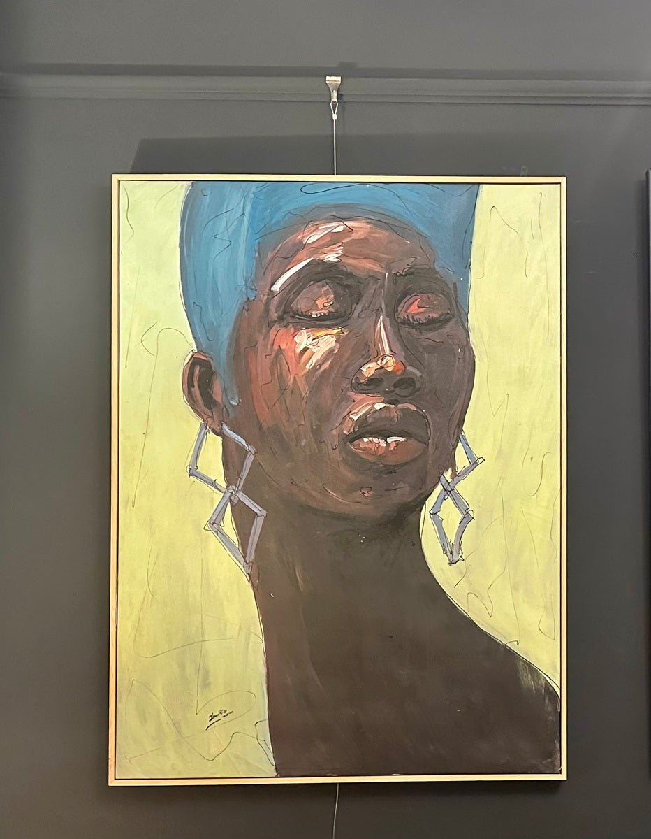 “My Choice” by Odofin Ernesto is a vibrant, hand-signed acrylic on canvas portrait of a strong Black female with blue hair and geometric earrings, set against a yellow-green background in a light wood frame.