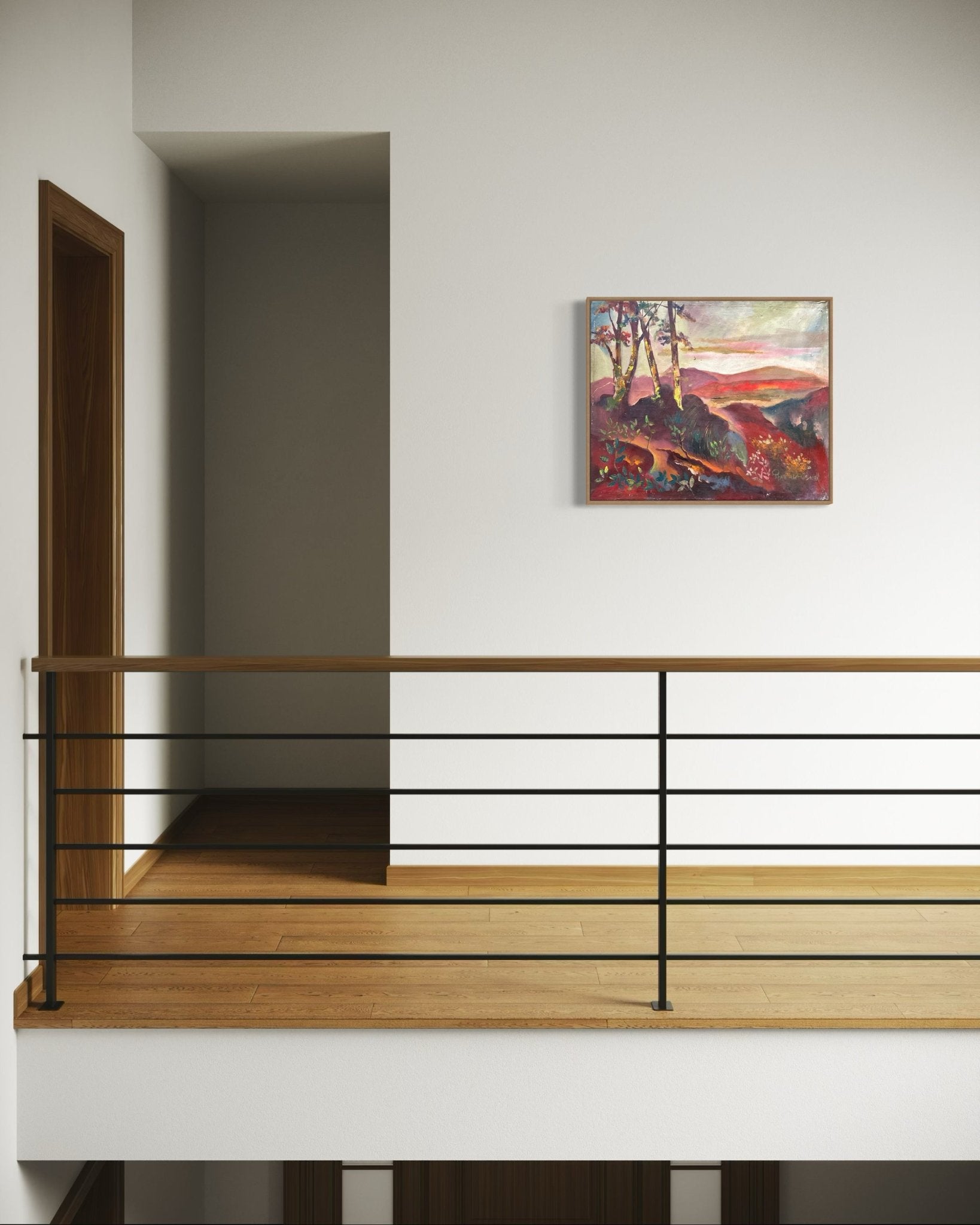 A minimalist hallway with wooden floors, a black metal railing, a closed wooden door, and "Nature II" Original Landscape Oil Painting by Alakhume (Pitar Alakhume), complete with a certificate of authenticity, on the white wall.