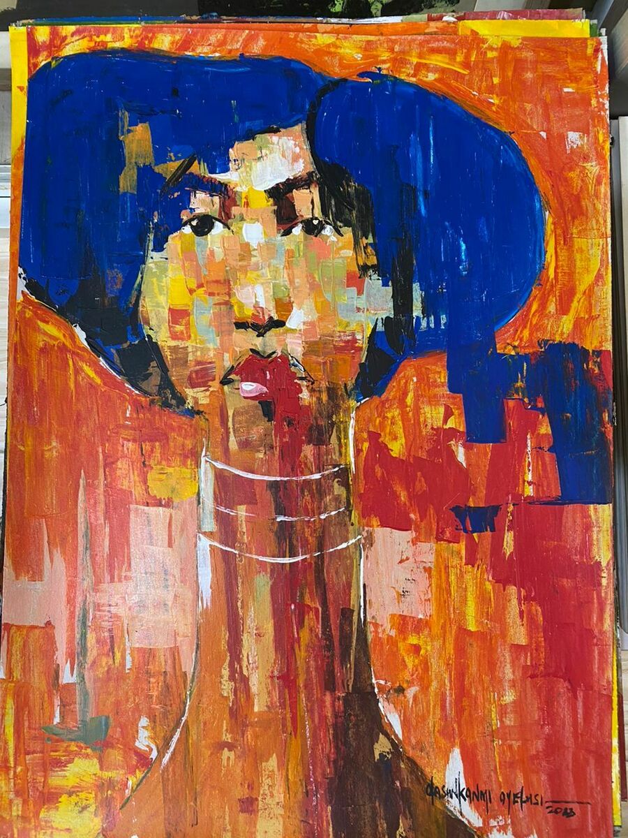 Part of the "One of a Kind Series" by Olasunkanmi Oyelusi, this expressive acrylic-on-paper features a woman with blue hair and angular features. Bold orange, red, and yellow strokes make it vibrant and ready to frame.