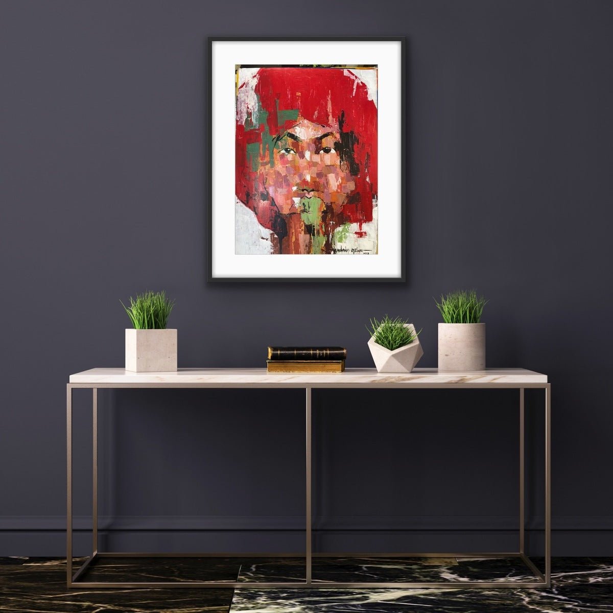 A modern console table with three potted plants and books stands against a dark gray wall, above which hangs "One of a Kind Series by Oyelusi"—an original acrylic piece by Olasunkanmi Oyelusi in a black frame.