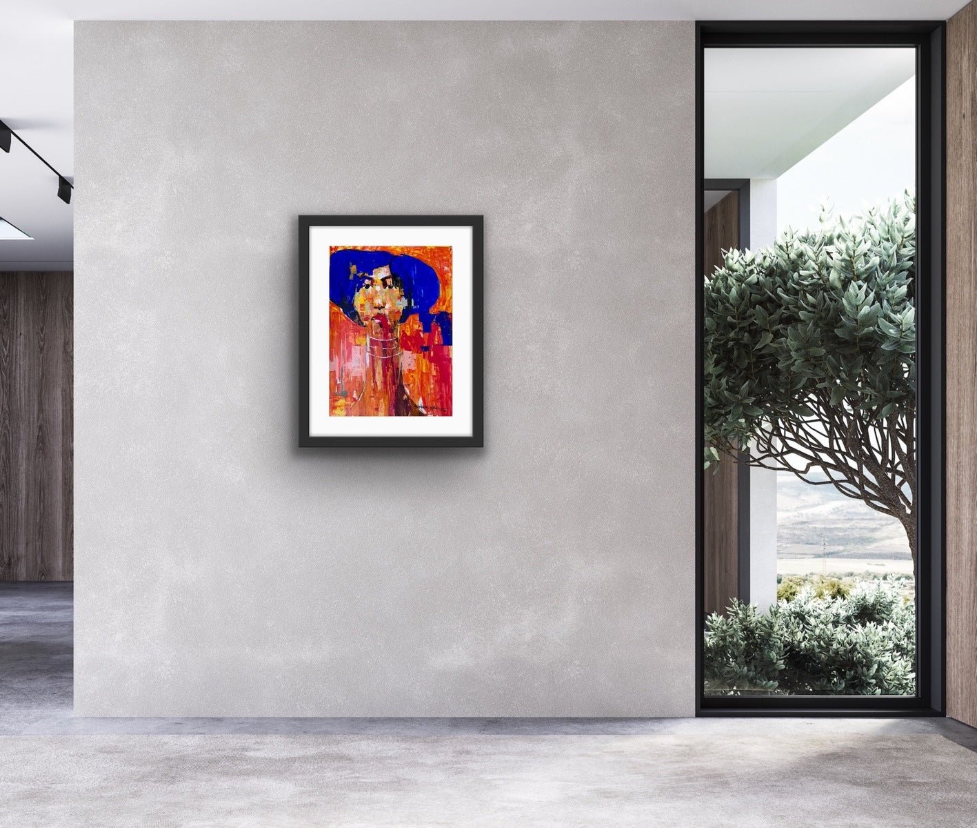 A modern space features a gray wall with "One of a Kind Series by Oyelusi," an original acrylic-on-paper painting by Olasunkanmi Oyelusi in a black frame. Nearby, a tall window frames a tree and outdoor scene.
