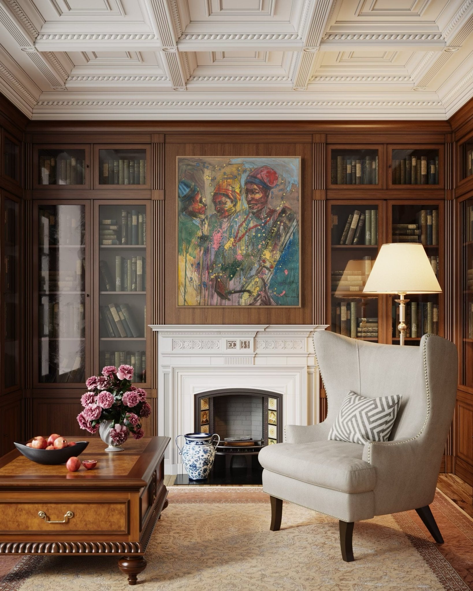 Elegant library with dark wood bookshelves, armchair with geometric pillow, lit floor lamp, coffee table with flowers and fruit, and 'Talking Drum'—a colorful hand-signed acrylic on canvas by Pitar Alakhume—above a white fireplace.