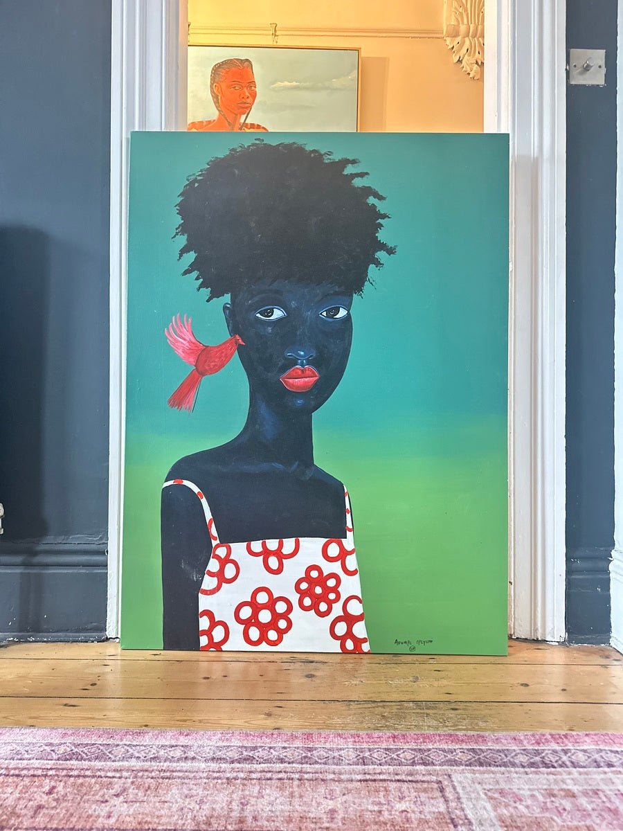 Phoenix" by Afuope Opeyemi is an acrylic on canvas expressionist portrait of a Black child in a white dress, with bright red lips and an afro, set against a green background. A red bird hovers near the face.