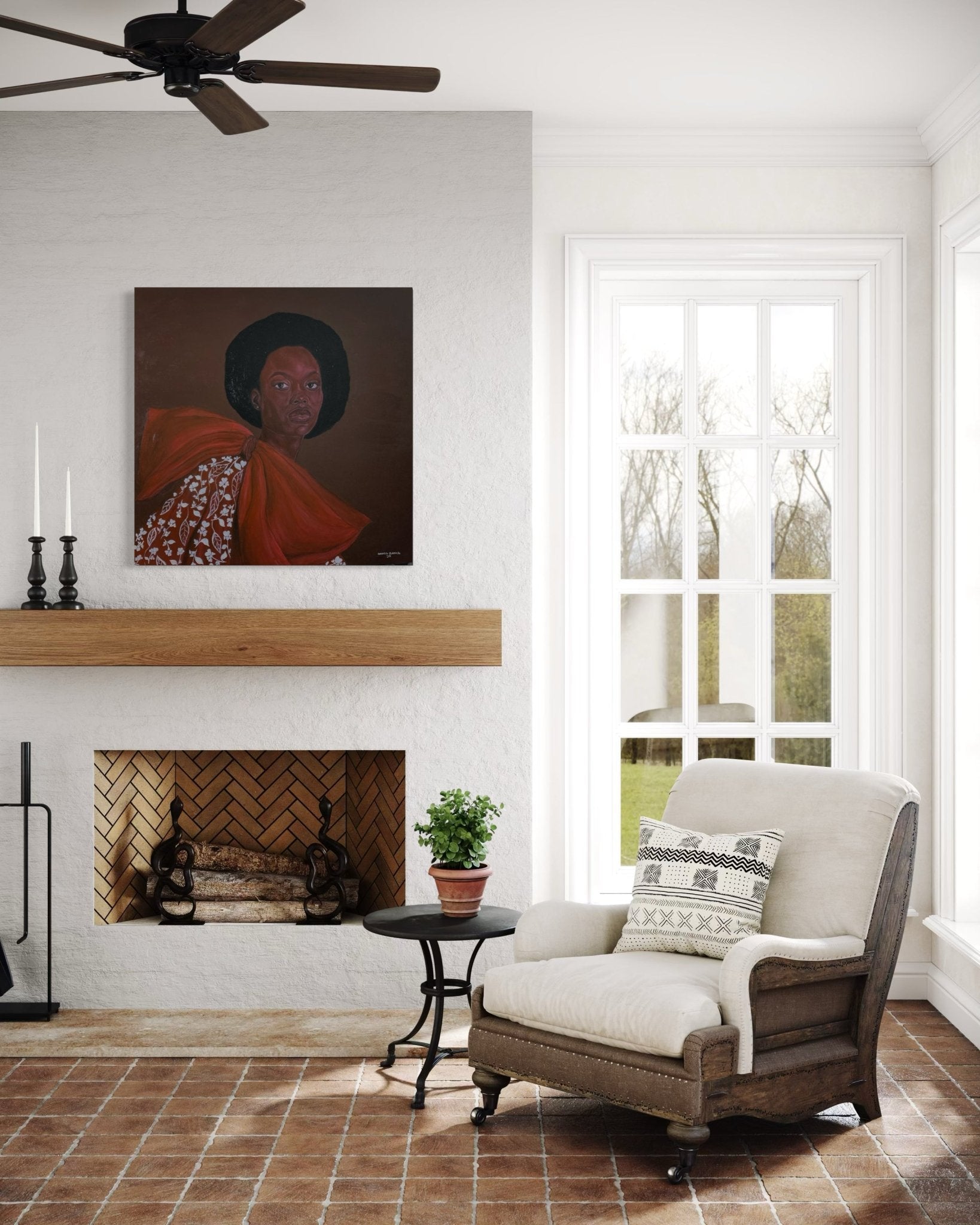 A cozy living room features a cushioned armchair, patterned pillow, small table with a plant, fireplace with candles, and "Portrait by Hammed Omobayo" from Hammed Olayanju Omobayo above the mantel. Includes certificate of authenticity.