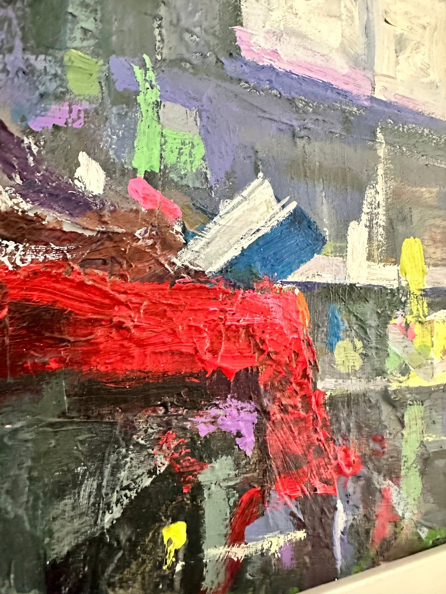 Close-up of "Waiting," a textured abstract painting by Nigerian artist Wande George, featuring bold red, green, purple, blue, yellow, and white acrylic on canvas with thick brushstrokes that create movement and depth.