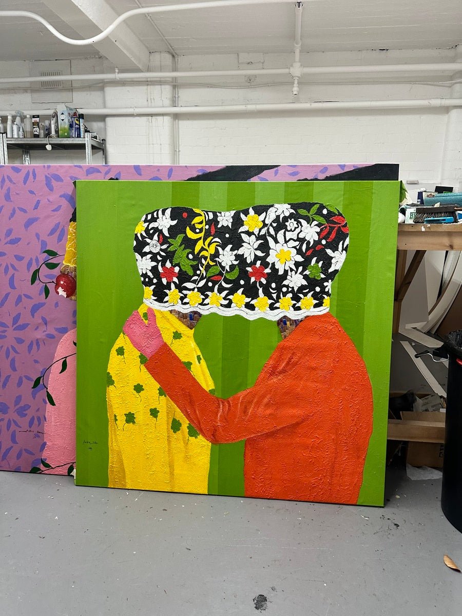 Secrets" by Slam Austin (122 x 122cm) is a vibrant acrylic on canvas showing two figures facing each other, faces obscured by a floral shape—one in yellow, one in red—set against green. This unique piece enhances any art studio.