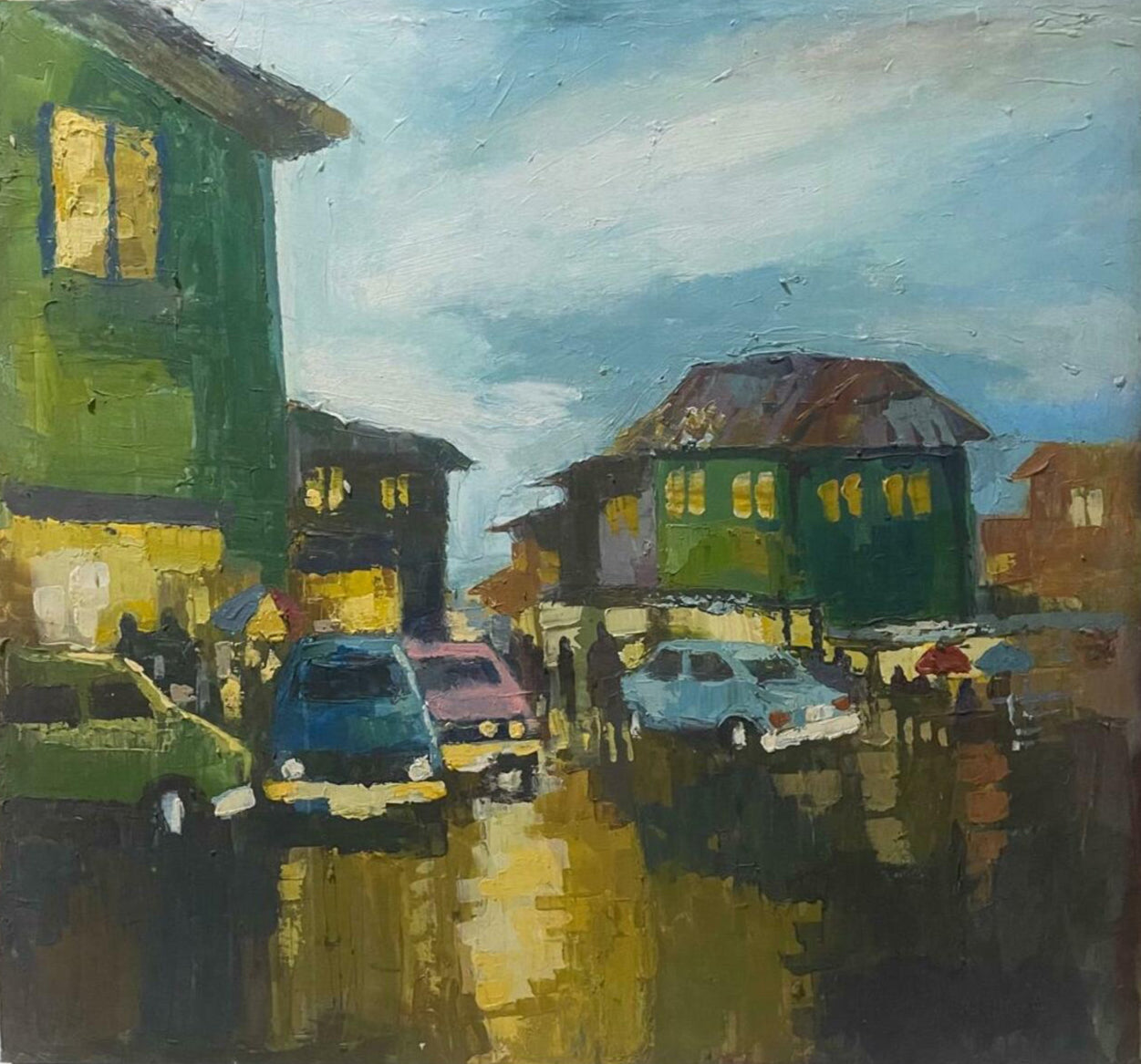 ‘Somewhere in Ibadan’ by Pitar Alakhume is a hand-signed artwork of a rainy dusk street with green buildings, glowing windows, and umbrellas. Includes certificate of authenticity.