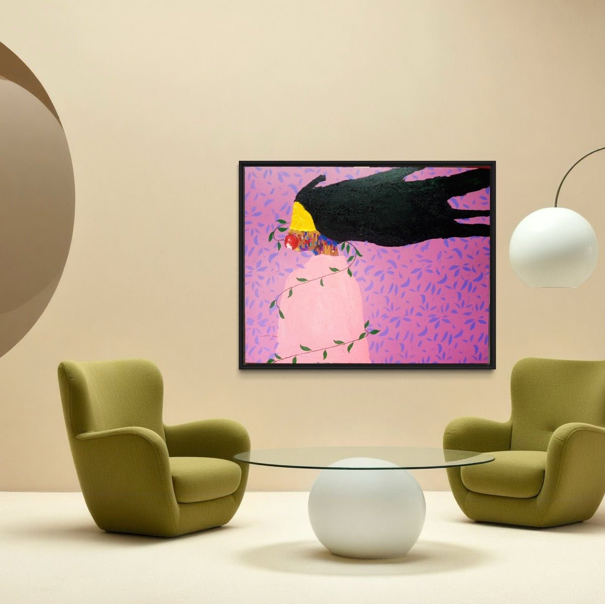 Two green armchairs and a round glass table furnish a modern space. On the beige wall hangs Slam Austin’s "Soul," an acrylic on canvas painting of a black bird with a yellow head and pink background. Sleek round white lamps complete the look.