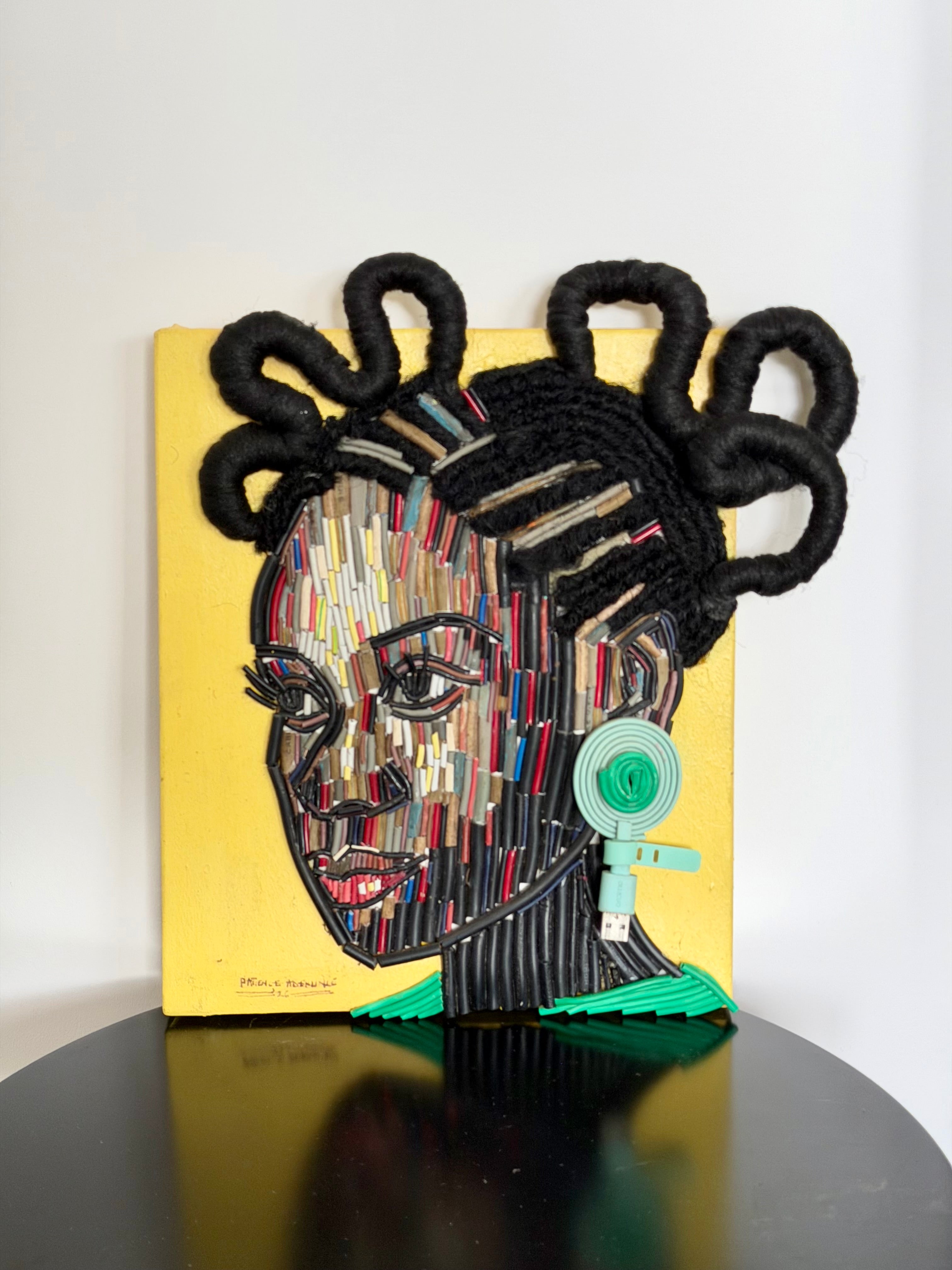 "One Body, Many Lines" Electronic Cable on Canvas by Patience Adekunle.