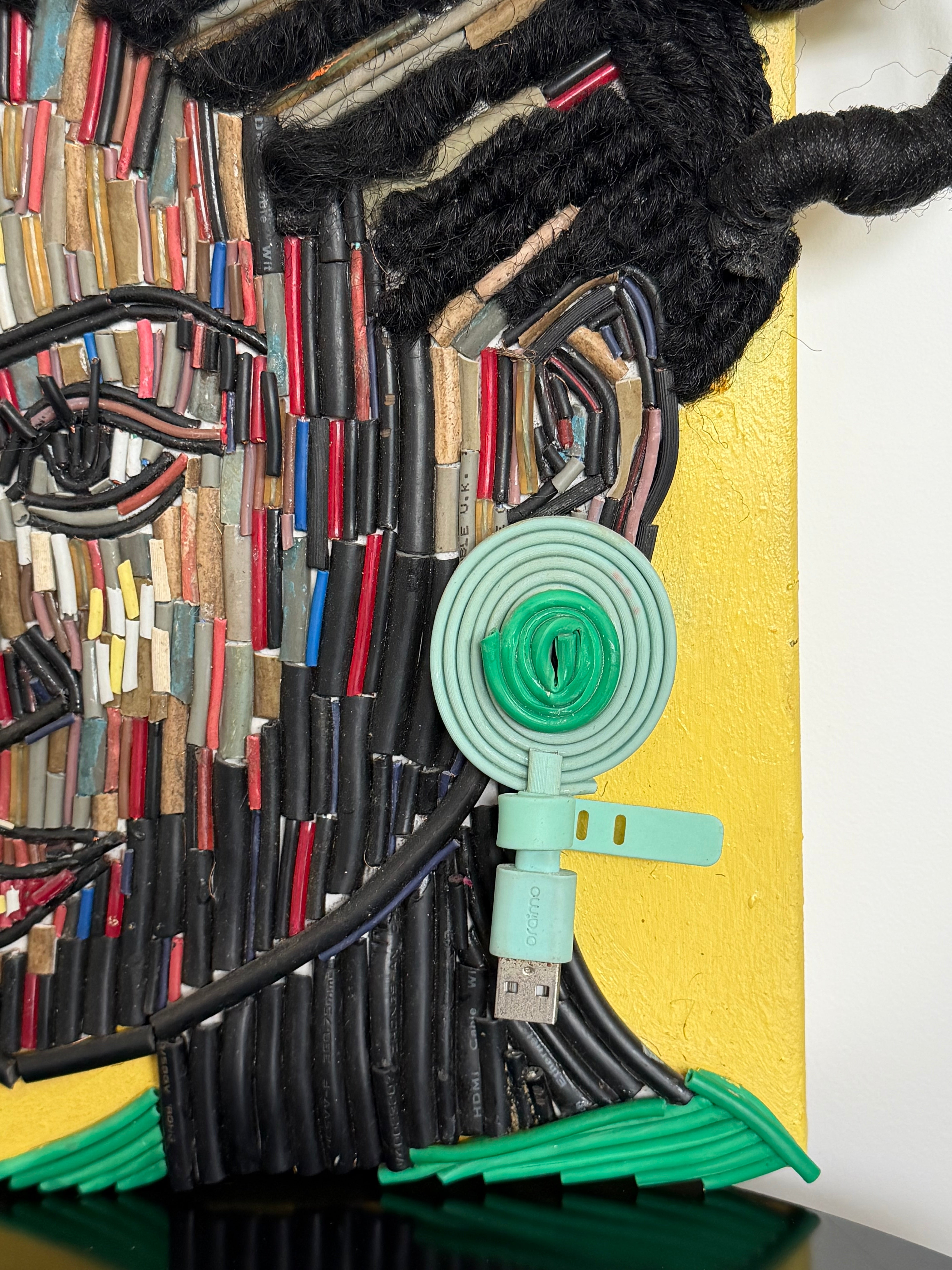 "One Body, Many Lines" Electronic Cable on Canvas by Patience Adekunle.