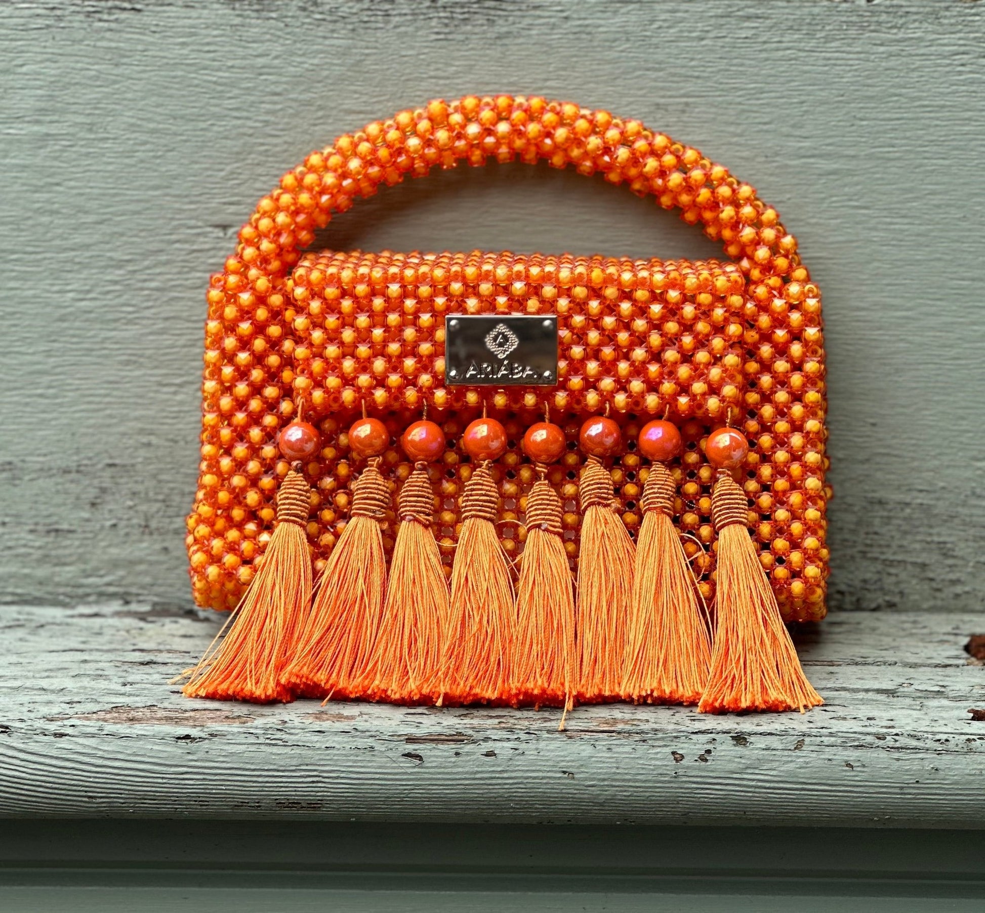 Ariaba Ira Tasseled Bag - Orange - Bibianna African Art Collective