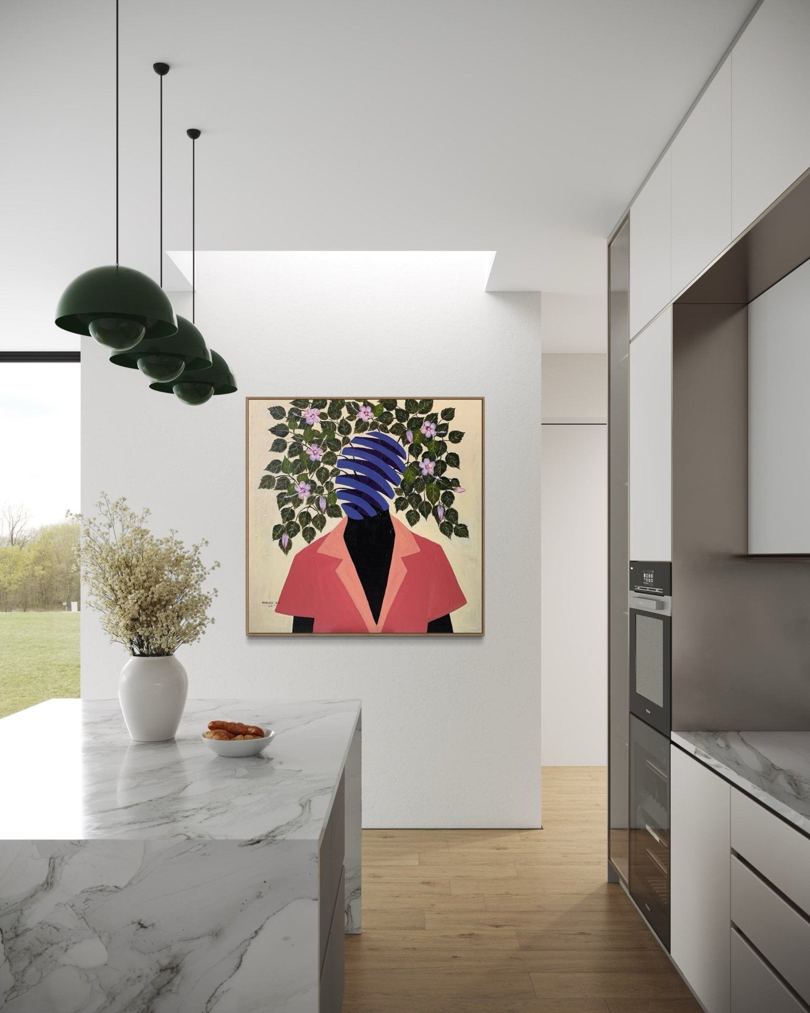 Modern kitchen with marble island and green pendant lights, featuring "Beyond Me" by Ayorinde Ayobami Lekan—a striking mixed media on canvas of a blue-wrapped head with leaves and a red jacket—adding unique style to the space.