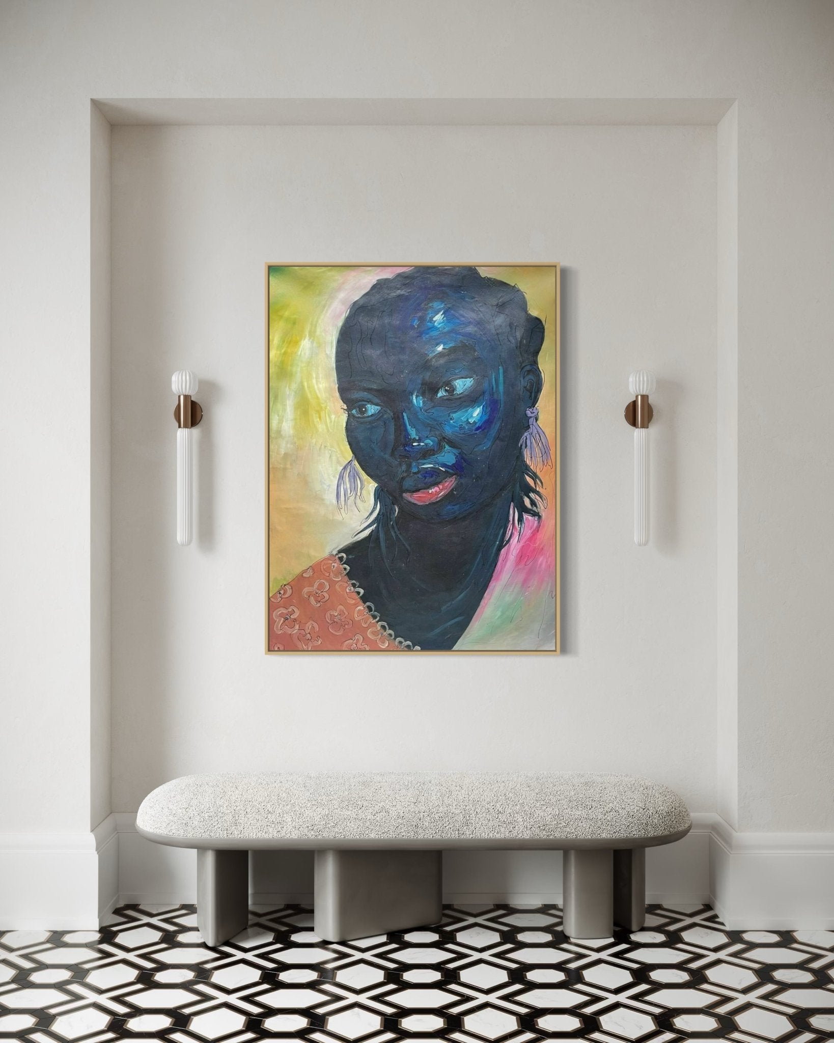 A minimalist hallway with a geometric black-and-white tiled floor, a cushioned bench, modern wall sconces, and "Black and Beautiful," an expressionist portrait by Odofin Ernesto, featuring a woman with blue-toned skin.
