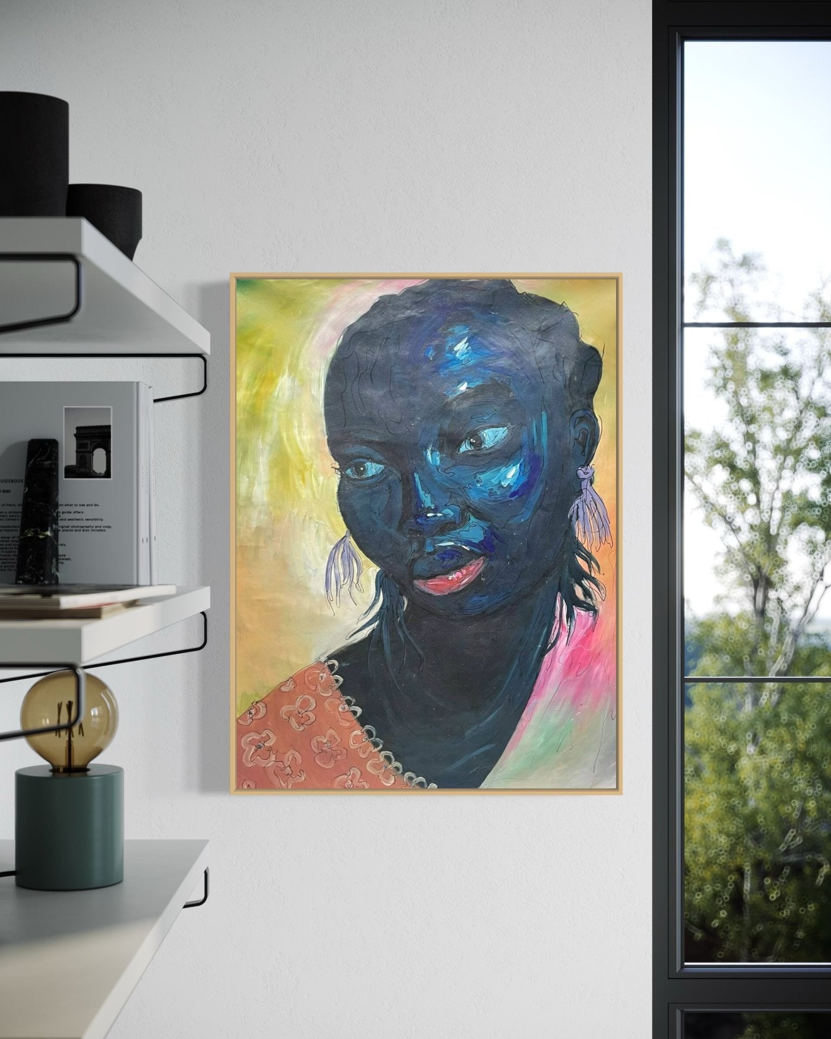 Odofin Ernesto’s framed, hand-signed "Black and Beautiful" expressionist portrait—a striking acrylic on canvas of a woman with dark blue skin tones—hangs on a white wall near shelves and a desk. Includes certificate of authenticity.