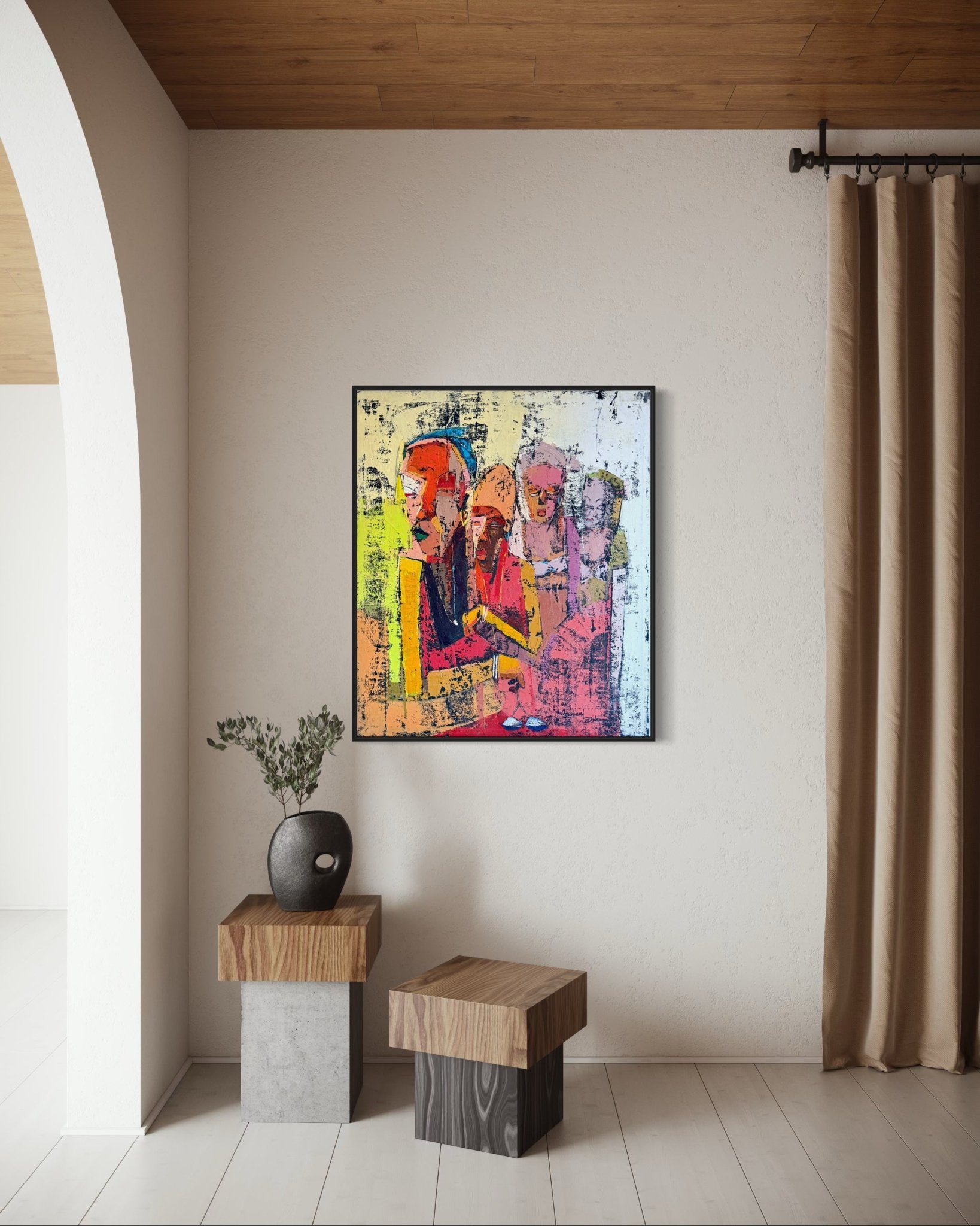 A modern living space with light walls, wood ceiling, and neutral curtains displays Dolapo Ogunnusi’s hand-signed 'Gender Equality' painting above two wooden cube tables and a black vase with greenery, including a certificate of authenticity.