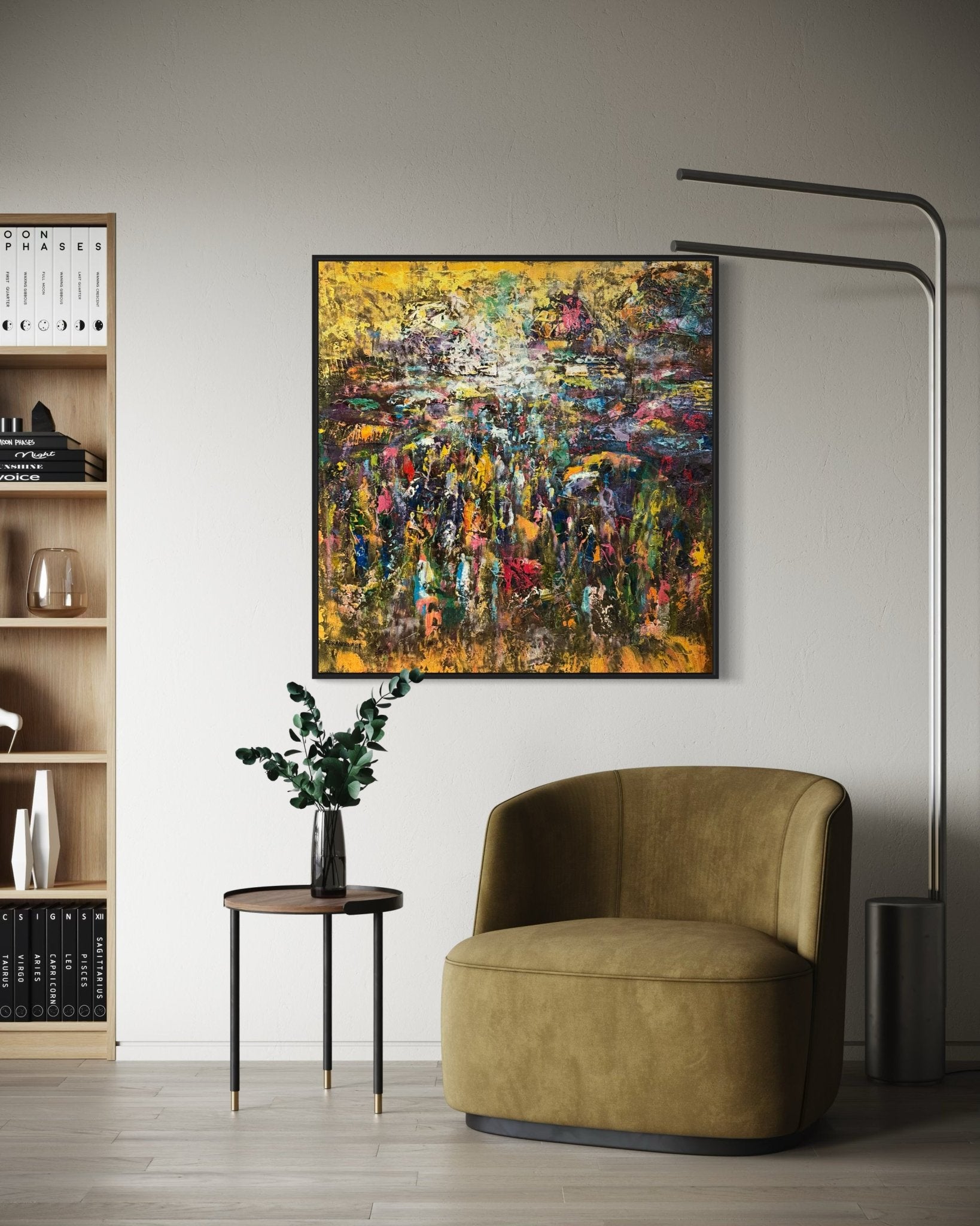 A modern living room with a green velvet chair, round side table and plant, built-in shelves, arched floor lamp, and "Market" by J.O. Aransiola—a colorful painting inspired by African market culture—on the wall.