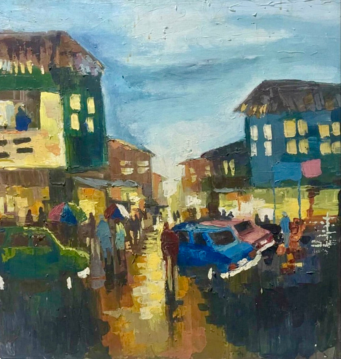 Somewhere in Ibadan II" by Pitar Alakhume captures a lively city street at dusk with people carrying umbrellas, colorful buildings, and cars on a wet road. This original artwork is hand-signed and includes a certificate of authenticity.